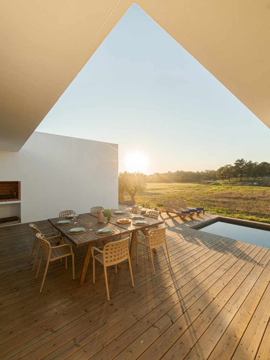 dinner-table-setting-in-modern-villa-terrace.jpg